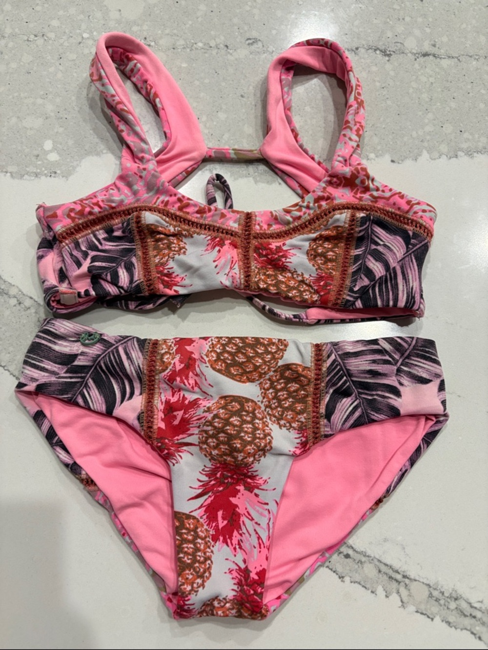 Maaji girls two piece reversible swim.